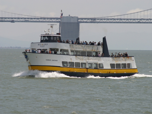 Emporor Norton attached to the Bow of the "Harbor Emporer" Tourist Boat in San Francisco Harbor - today.